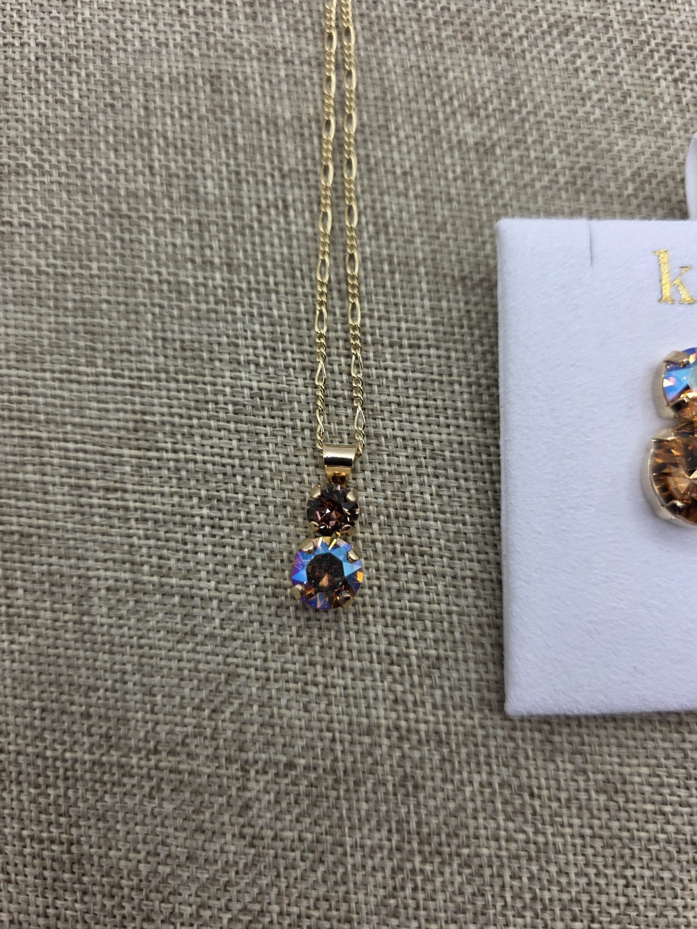 Gold-tone Necklace with Iridescent and Champagne Crystals and Matching Earrings.